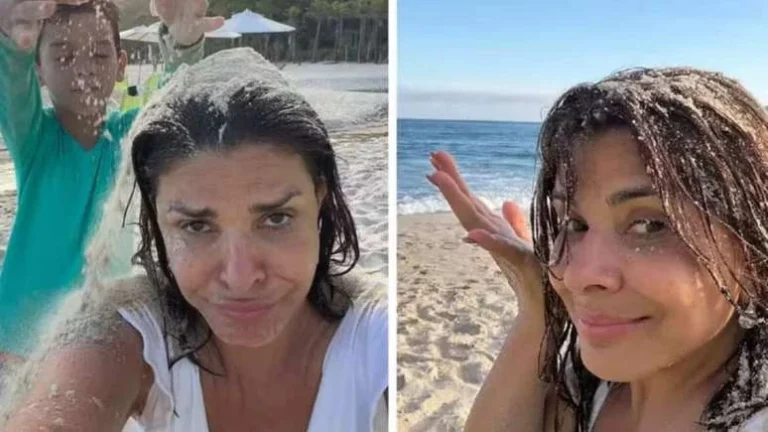 Mara Maravilha brinca com filho único na praia e toma areia na cabeça